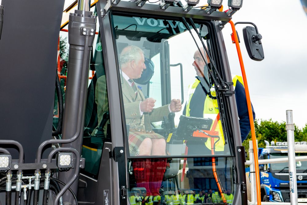 Prince Charles in excavator